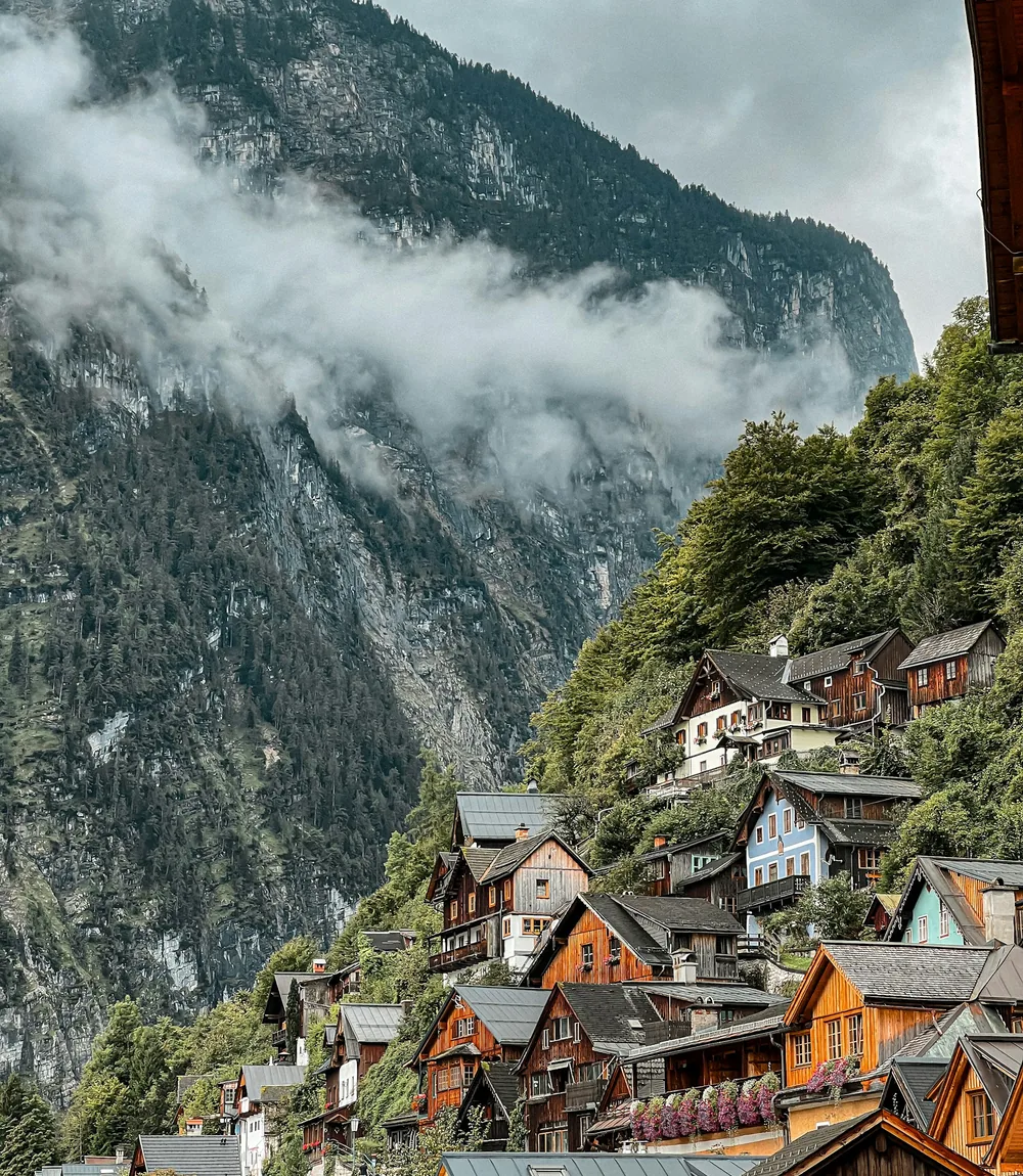 A narrow lane between traditional houses in Hallstatt village